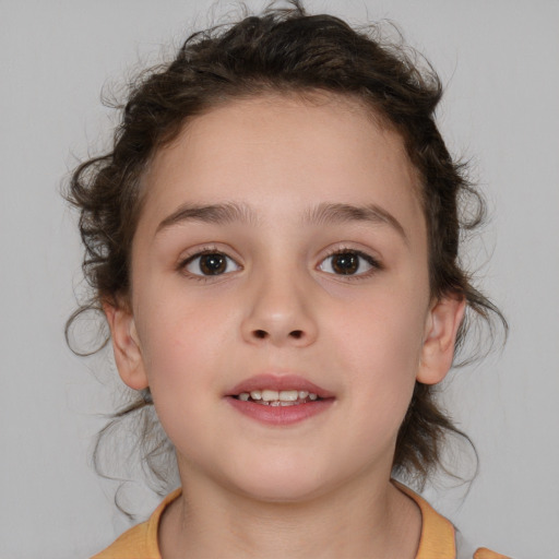 Joyful white child female with medium  brown hair and brown eyes