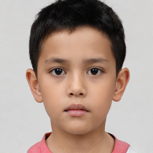 Neutral asian child male with short  brown hair and brown eyes