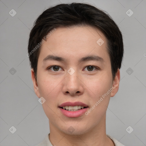 Joyful asian young-adult male with short  brown hair and brown eyes