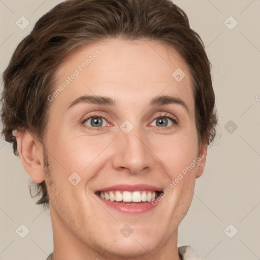 Joyful white young-adult female with short  brown hair and grey eyes