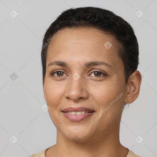 Joyful latino young-adult female with short  brown hair and brown eyes