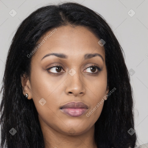 Joyful asian young-adult female with long  black hair and brown eyes