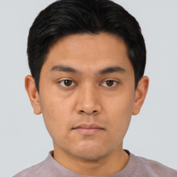 Neutral asian young-adult male with short  black hair and brown eyes