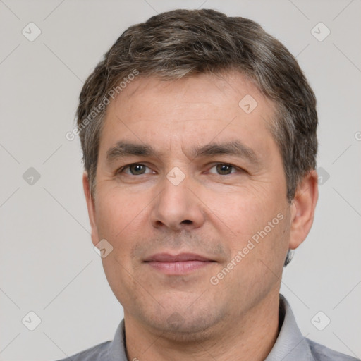 Neutral white adult male with short  brown hair and brown eyes