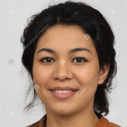 Joyful latino young-adult female with medium  black hair and brown eyes