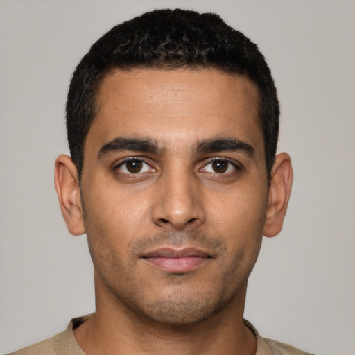 Neutral latino young-adult male with short  black hair and brown eyes