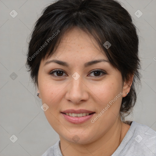 Joyful white adult female with medium  brown hair and brown eyes