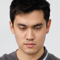 Neutral asian young-adult male with short  brown hair and brown eyes