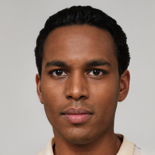 Neutral latino young-adult male with short  black hair and brown eyes