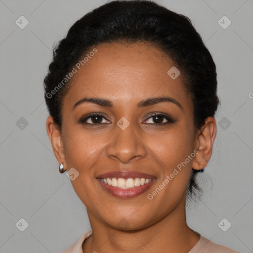 Joyful latino young-adult female with short  brown hair and brown eyes