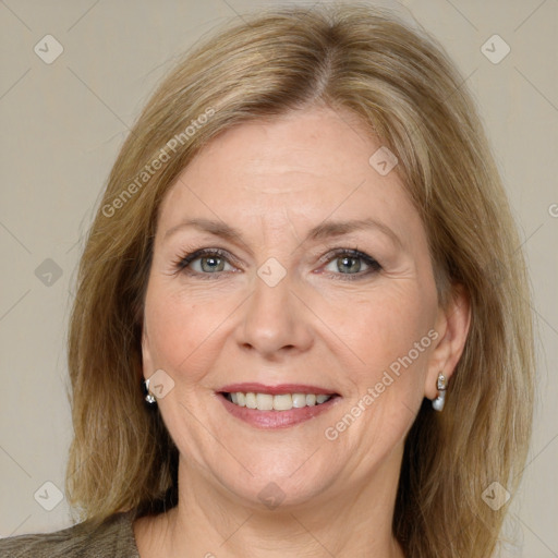 Joyful white adult female with medium  brown hair and grey eyes