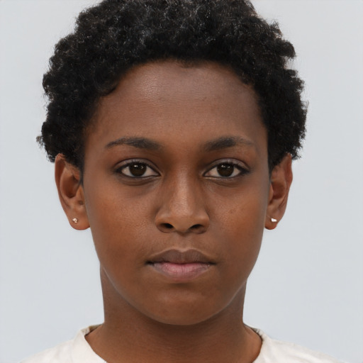 Neutral black young-adult female with short  brown hair and brown eyes