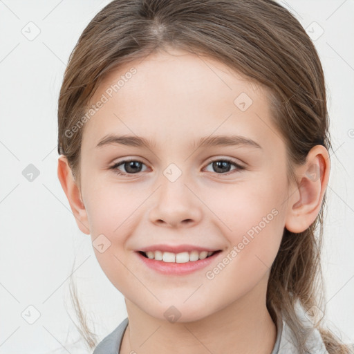 Joyful white child female with medium  brown hair and brown eyes