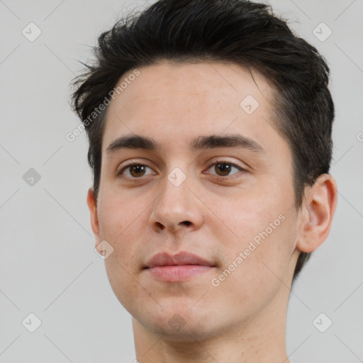 Neutral white young-adult male with short  brown hair and brown eyes