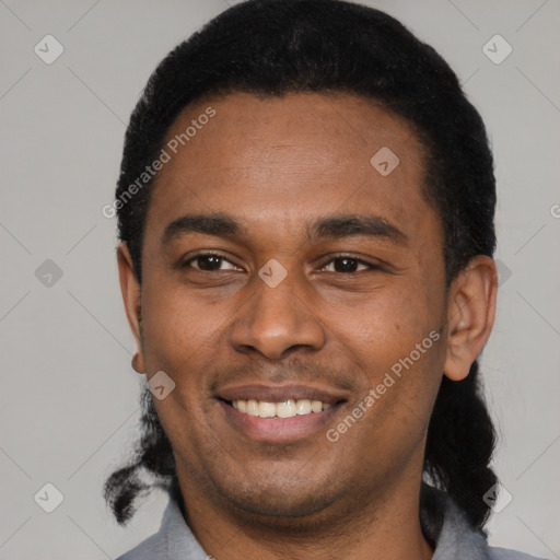 Joyful latino young-adult male with short  black hair and brown eyes