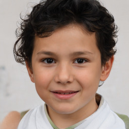 Joyful white child male with short  brown hair and brown eyes