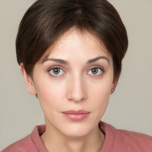 Neutral white young-adult female with short  brown hair and brown eyes