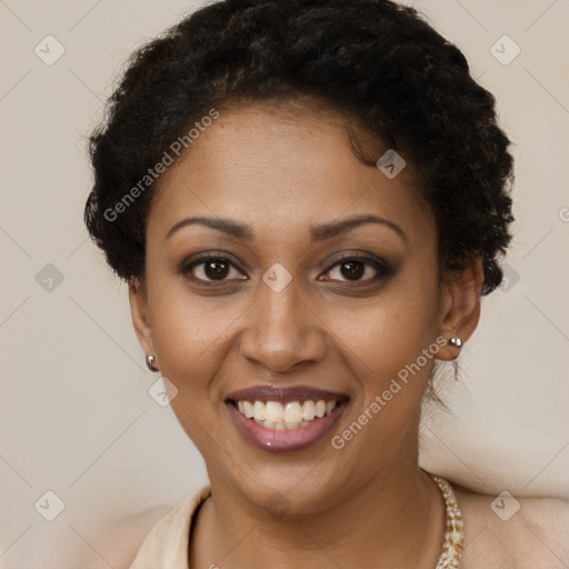 Joyful black young-adult female with short  brown hair and brown eyes