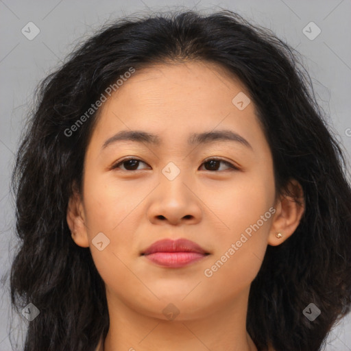 Joyful asian young-adult female with long  brown hair and brown eyes