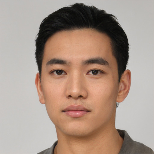 Neutral asian young-adult male with short  black hair and brown eyes