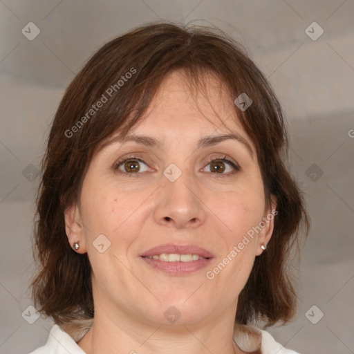 Joyful white adult female with medium  brown hair and brown eyes