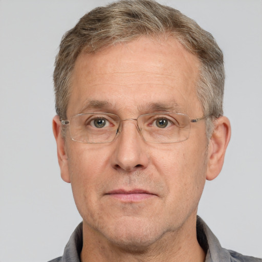 Joyful white middle-aged male with short  brown hair and brown eyes