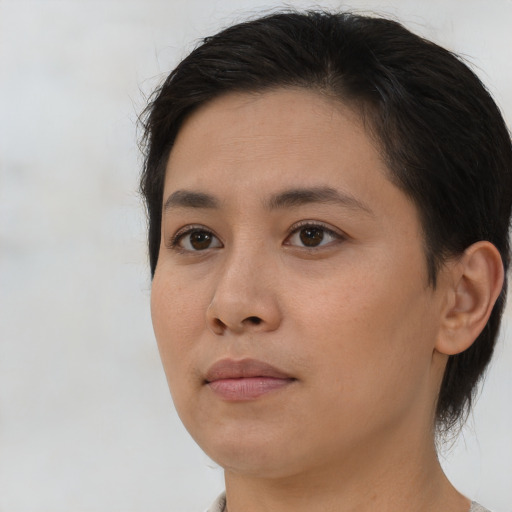 Neutral asian young-adult female with medium  brown hair and brown eyes