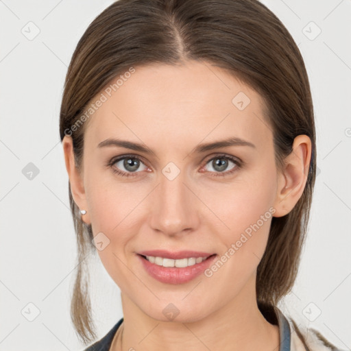 Joyful white young-adult female with medium  brown hair and grey eyes