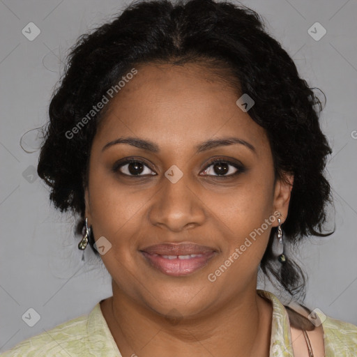 Joyful black adult female with medium  brown hair and brown eyes