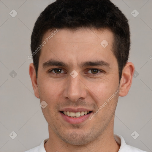 Joyful white young-adult male with short  brown hair and brown eyes