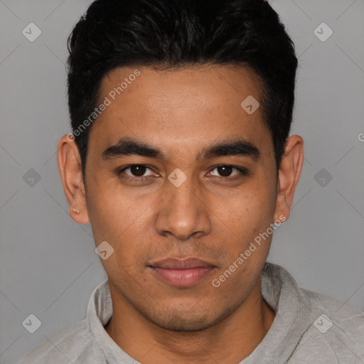 Neutral white young-adult male with short  black hair and brown eyes