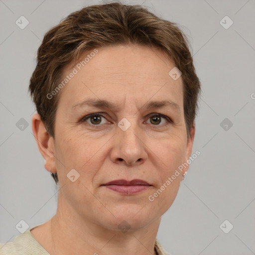 Joyful white adult female with short  brown hair and grey eyes