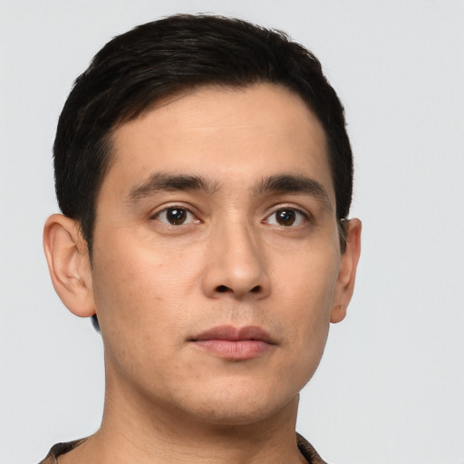 Neutral white young-adult male with short  black hair and brown eyes
