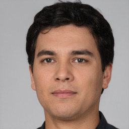 Neutral white young-adult male with short  black hair and brown eyes