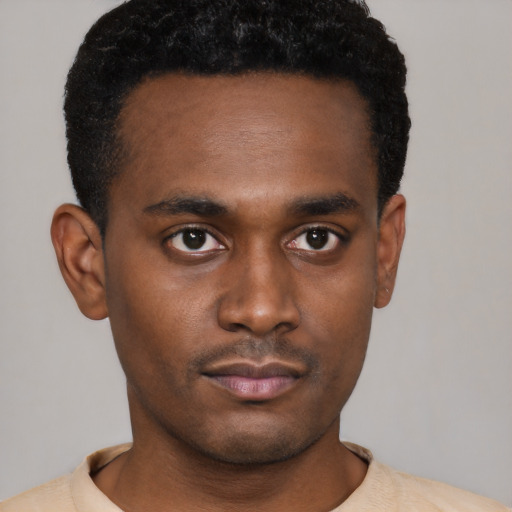 Neutral black young-adult male with short  black hair and brown eyes