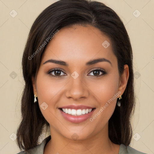 Joyful white young-adult female with long  brown hair and brown eyes