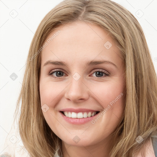 Joyful white young-adult female with long  brown hair and green eyes