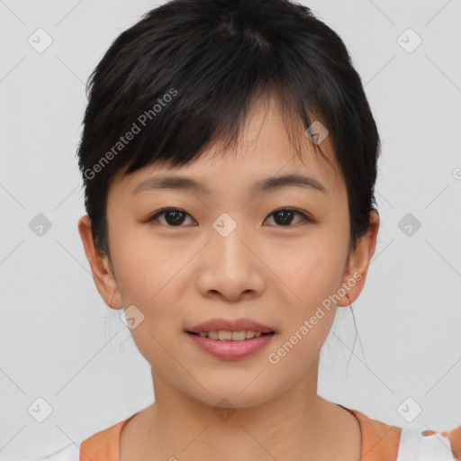 Joyful asian young-adult female with short  black hair and brown eyes