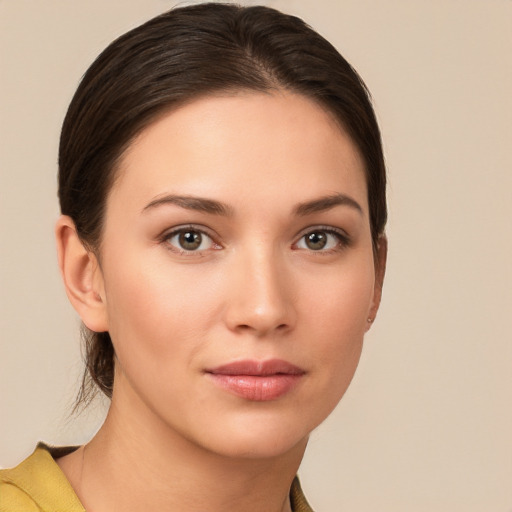 Neutral white young-adult female with medium  brown hair and brown eyes