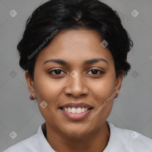 Joyful latino young-adult female with short  black hair and brown eyes