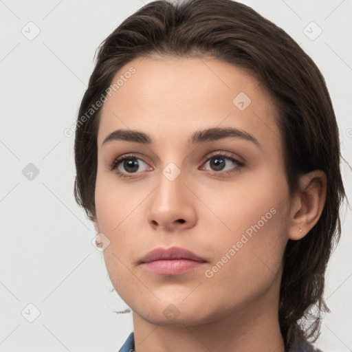 Neutral white young-adult female with medium  brown hair and brown eyes