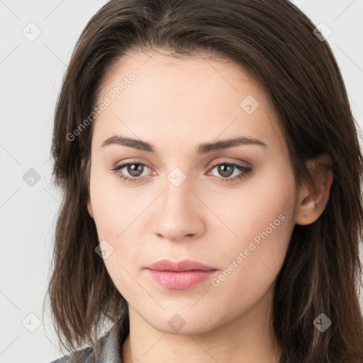 Neutral white young-adult female with long  brown hair and brown eyes