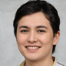 Joyful white young-adult female with medium  brown hair and brown eyes