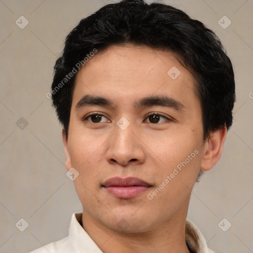 Joyful white young-adult male with short  black hair and brown eyes