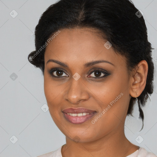 Joyful black young-adult female with medium  brown hair and brown eyes