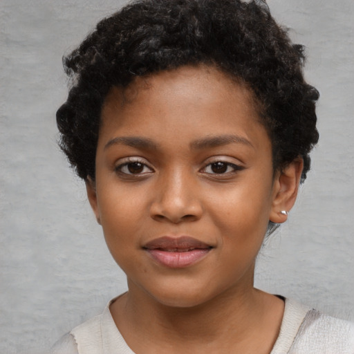 Neutral black child female with short  black hair and brown eyes