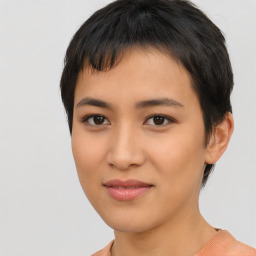 Joyful asian young-adult female with short  black hair and brown eyes