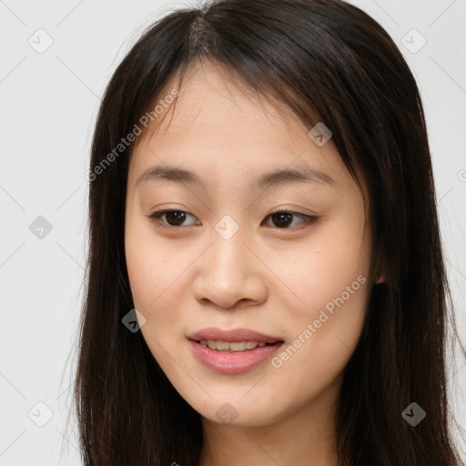 Joyful asian young-adult female with long  brown hair and brown eyes