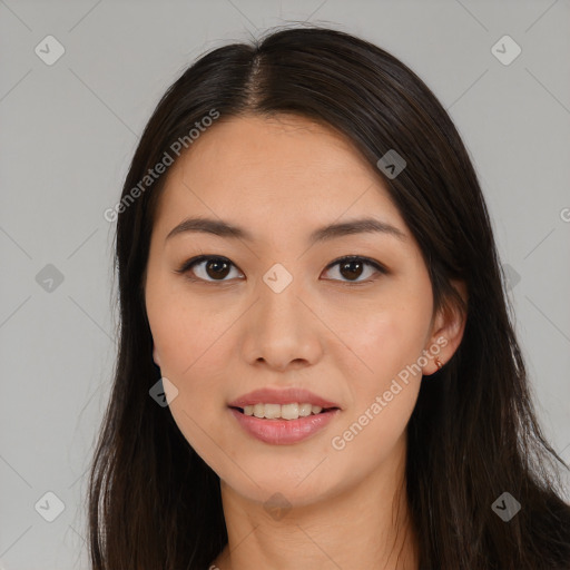 Joyful asian young-adult female with long  brown hair and brown eyes