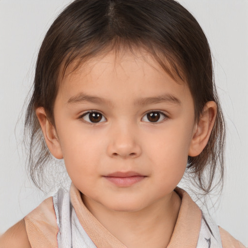 Neutral white child female with medium  brown hair and brown eyes